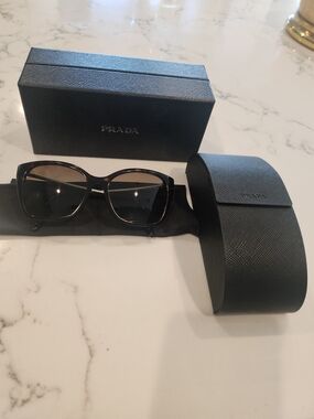 Prada Dark Tortoise w/ thin gold-toned metal temples Sunglasses w/Case & cloth